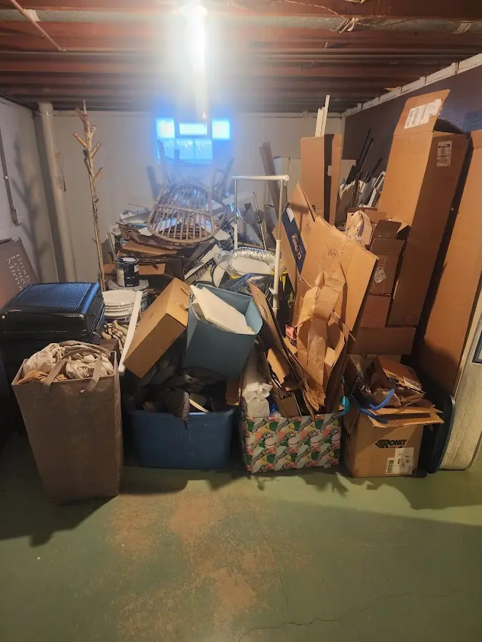 Roll-off dumpster container at job site for 6 Yard Dumpster Rental in Hamilton